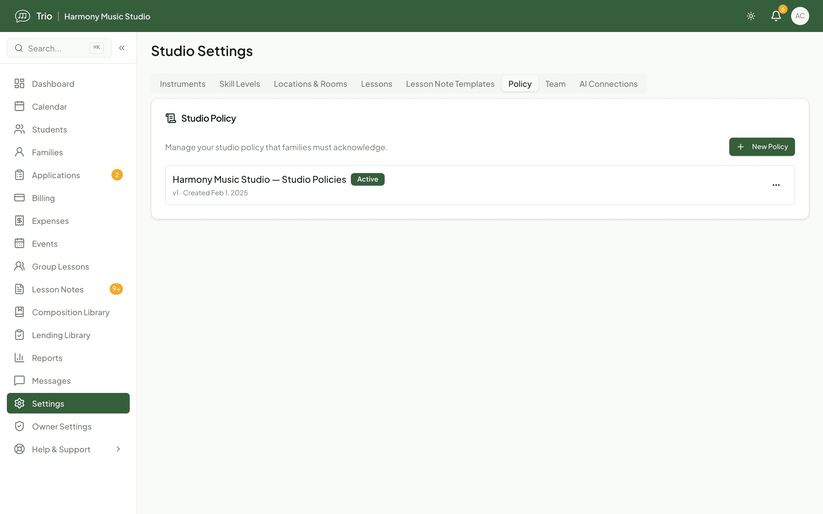 Trio Studio Settings policy tab showing an active, versioned studio policy that families must acknowledge.